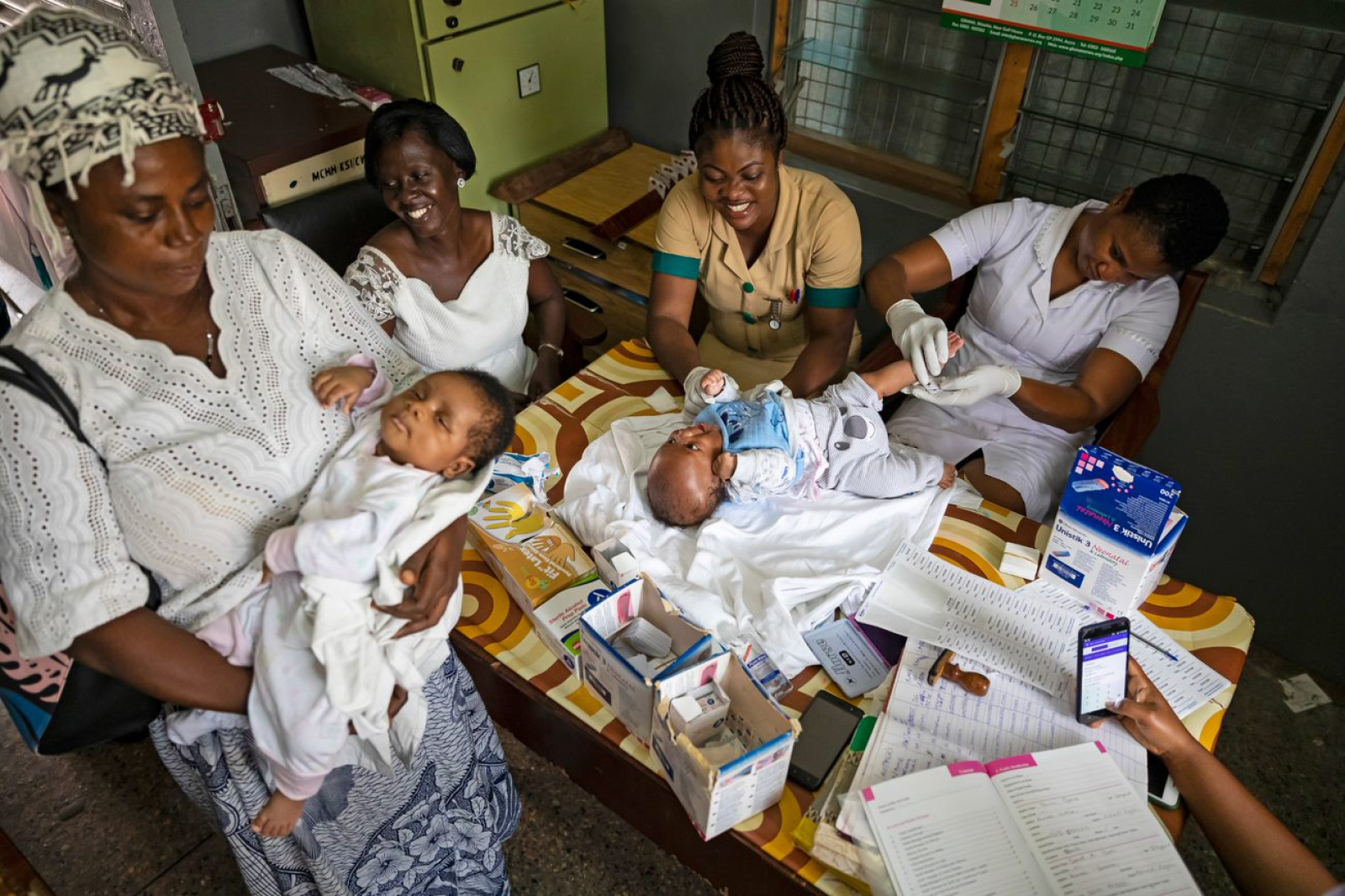 Health workers at a hospital in Ghana screen newborns for sickle cell disease